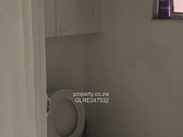 Harare CBD Office: Secure Walled Property with Paved Yard