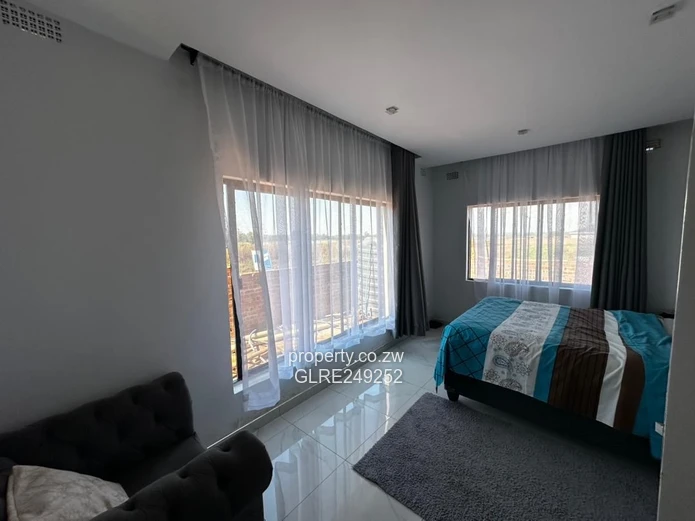 Spacious 4-Bed Home with Vaulted Lounge & Borehole — Nyeredzi Ridge