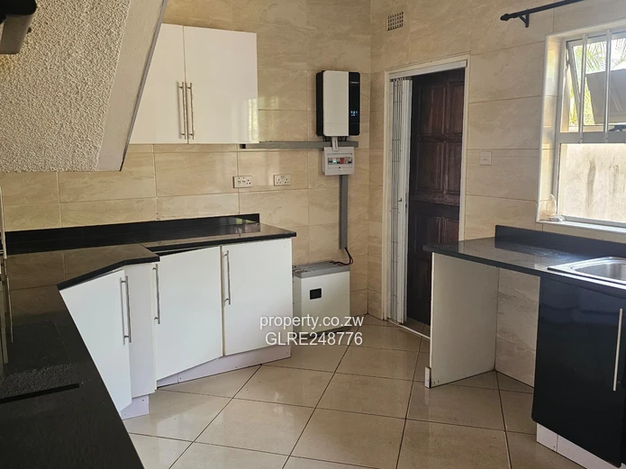 3BR Greendale Flat with Built-in Wardrobes, Borehole & Parking
