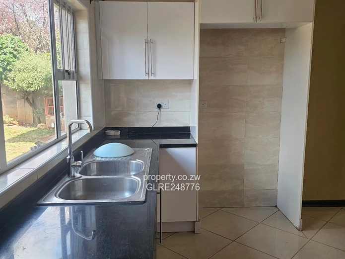 3BR Greendale Flat with Built-in Wardrobes, Borehole & Parking