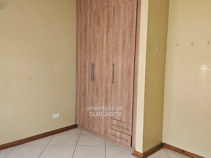 3BR Greendale Flat with Built-in Wardrobes, Borehole & Parking