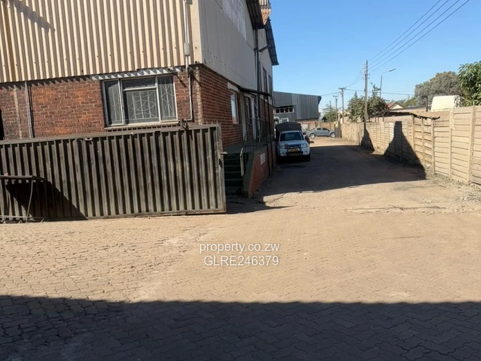 360sqm Ardbennie Warehouse for Rent — Roller Doors & Borehole