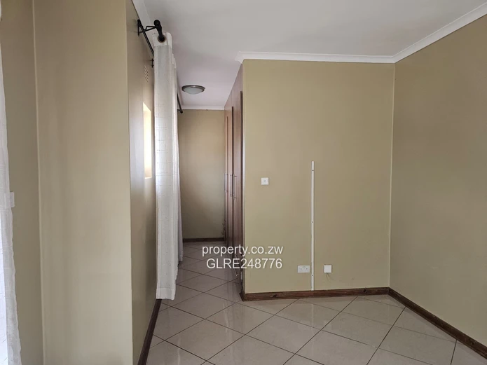 3BR Greendale Flat with Built-in Wardrobes, Borehole & Parking