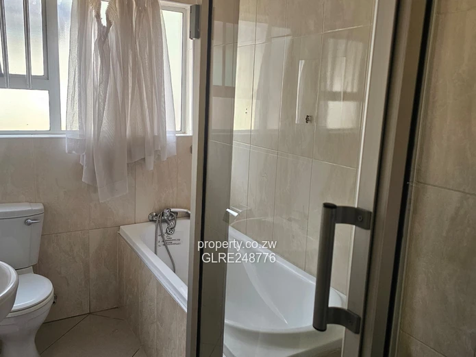 3BR Greendale Flat with Built-in Wardrobes, Borehole & Parking