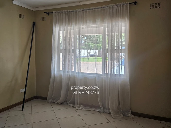 3BR Greendale Flat with Built-in Wardrobes, Borehole & Parking