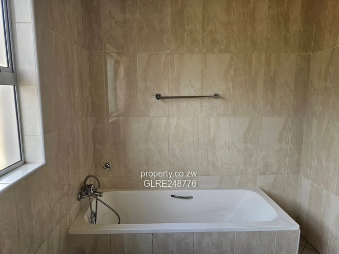 3BR Greendale Flat with Built-in Wardrobes, Borehole & Parking