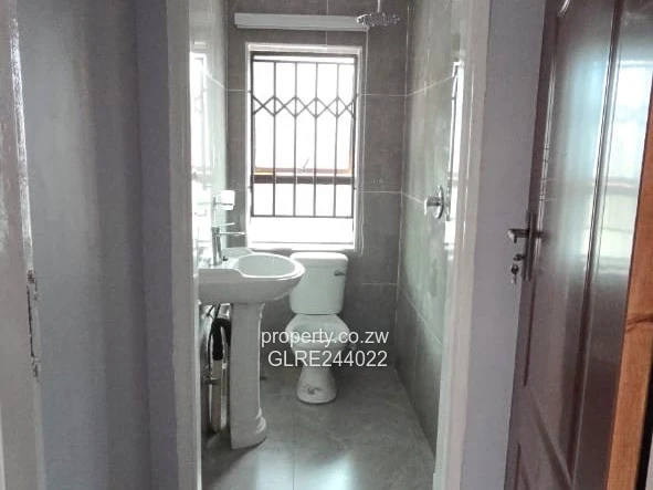 Paved Red-Brick 2-Bed Home with Borehole in Mabelreign