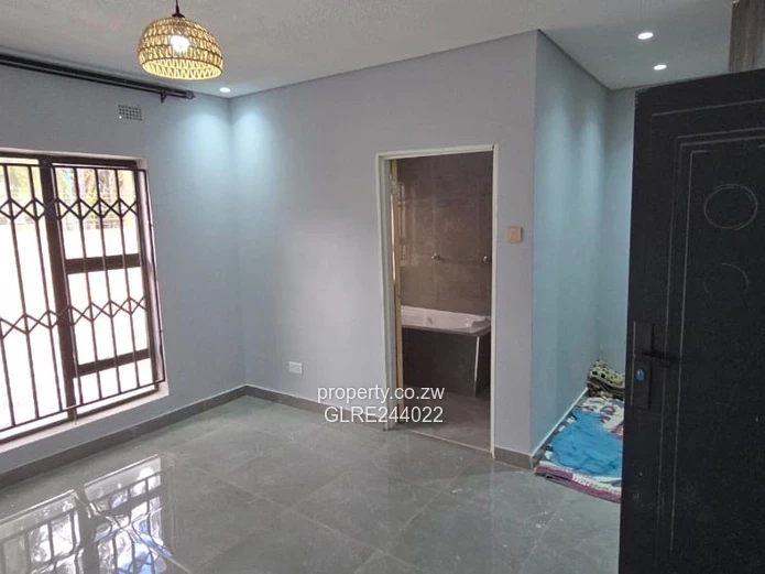 Paved Red-Brick 2-Bed Home with Borehole in Mabelreign